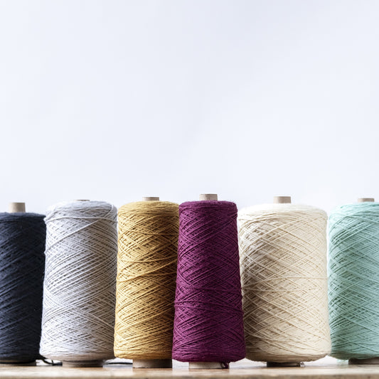 Germantown yarn on cones, as they are produced at our North Carolina mill.