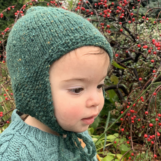 Gilda wearing a green tweed hat in BC Garn Loch Lomond.